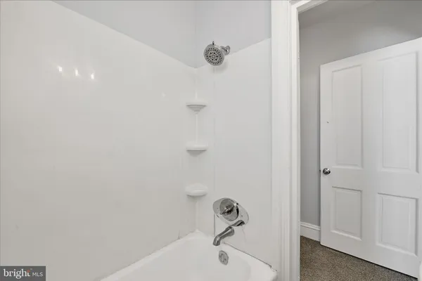 a bathroom with a bathtub