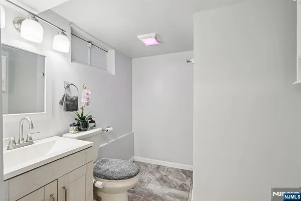 a bathroom with a sink and a toilet