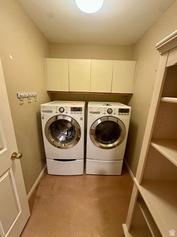 1715 Darling Street, Unit 3 Ogden, UT 84403 - Photo 12 of 26 Dedicated laundry area featuring front-loading appliances