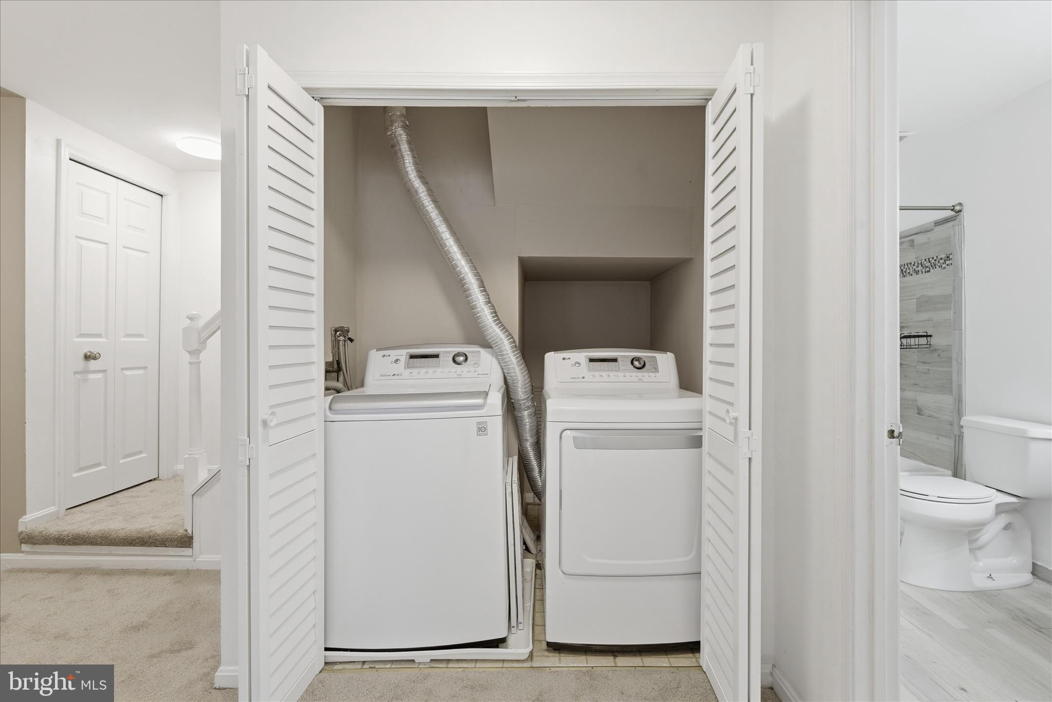 4167 Churchman Way Woodbridge, VA 22192 - Photo 36 of 36 a utility room with dryer and washer