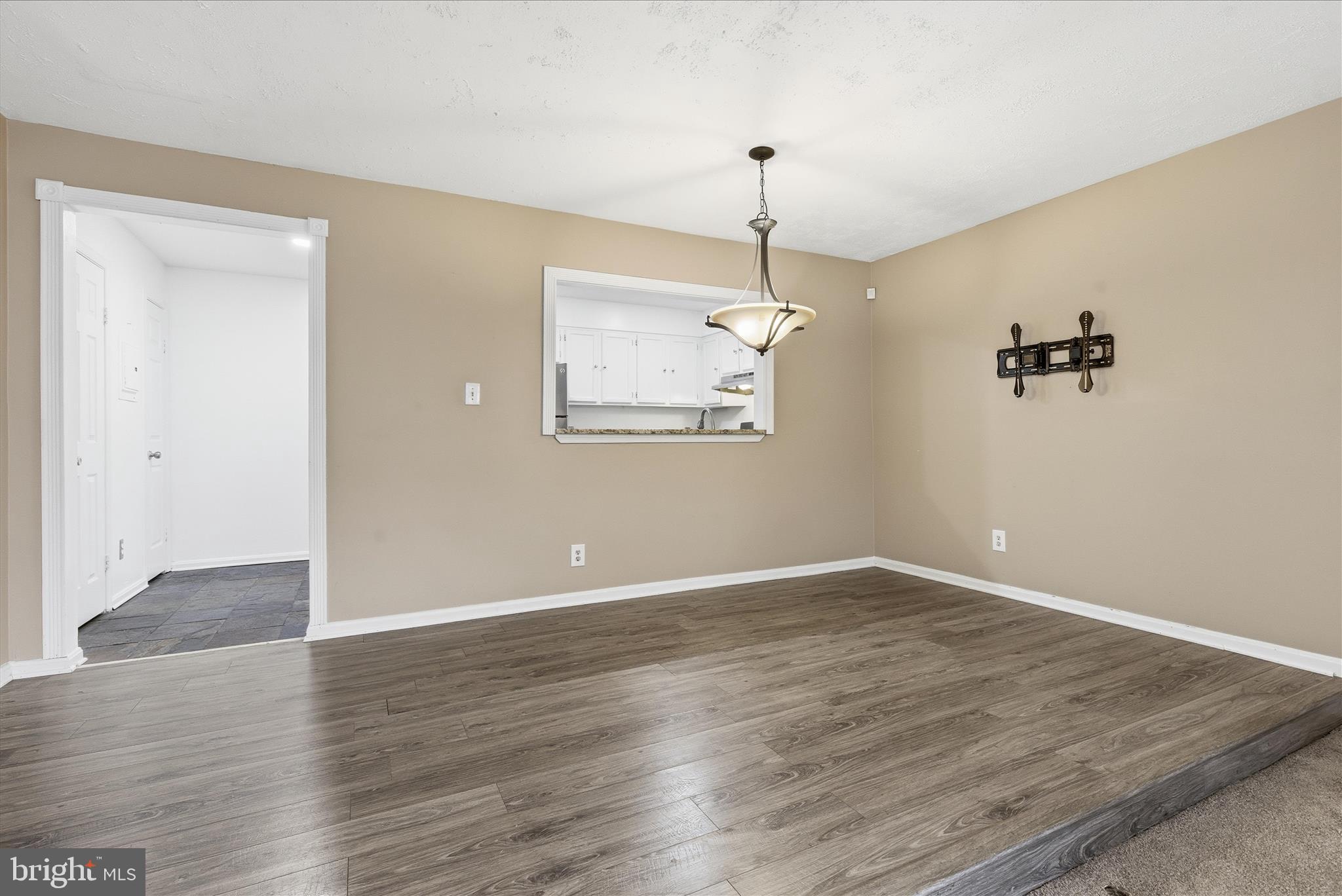 4167 Churchman Way Woodbridge, VA 22192 - Photo 7 of 36 wooden floor in an empty room with a window