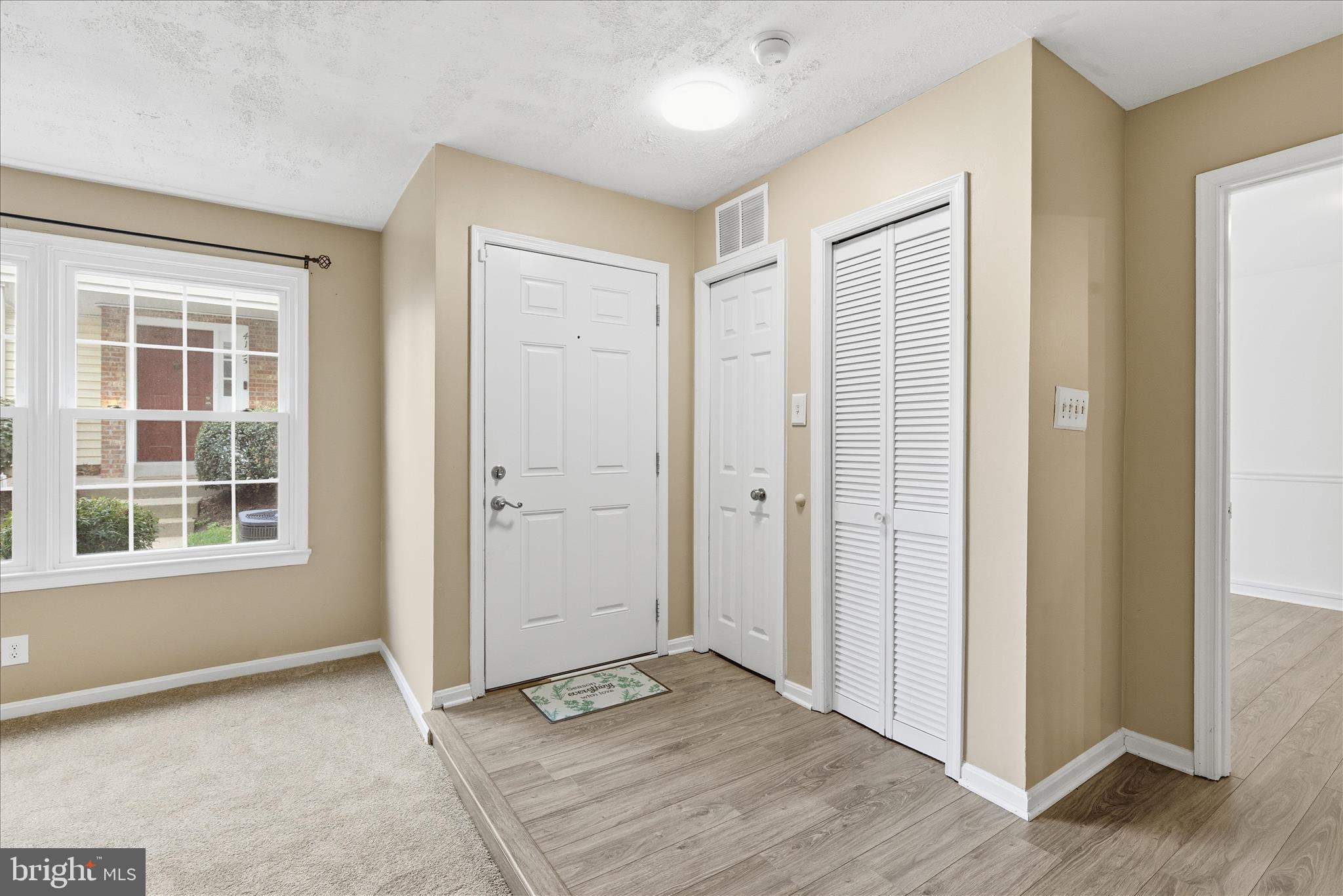 4167 Churchman Way Woodbridge, VA 22192 - Photo 8 of 36 an empty room with windows and closet