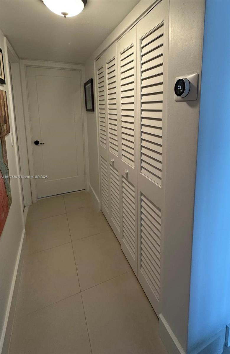 10040 Northwest 9th St Circle, Unit 202 Miami, FL 33172 - Photo 9 of 17 a view of bathroom with shower