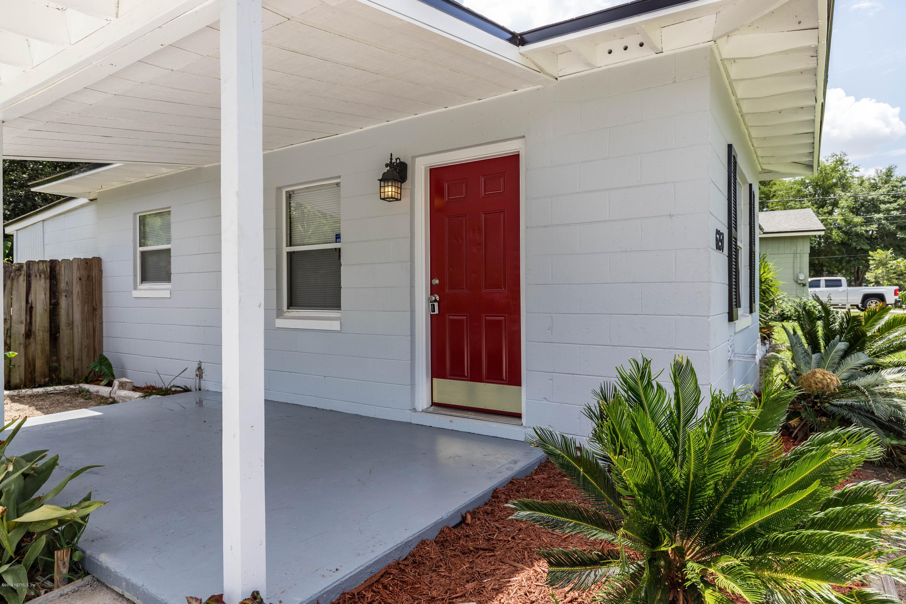 6750 Banbury Road Jacksonville, FL 32211 - Photo 4 of 45 a view of a entryway door of the house