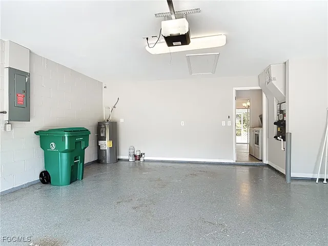 a view of an empty room with a fan