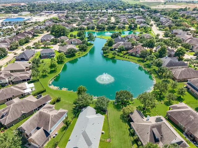 an aerial view of residential house with outdoor space
