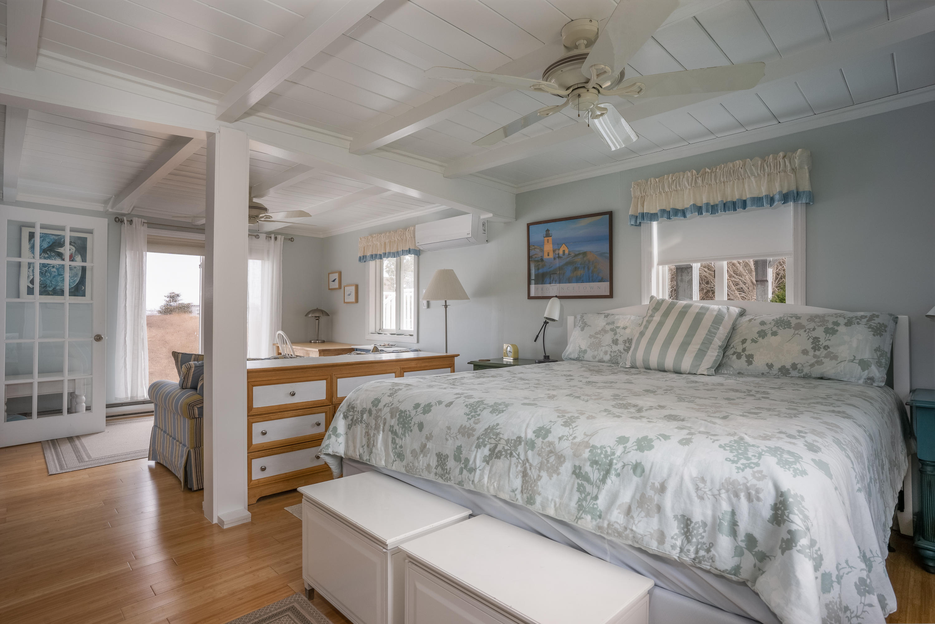 11 Bay View Drive Truro, MA 02666 - Photo 11 of 16 a spacious bedroom with a bed and closet with wooden floor