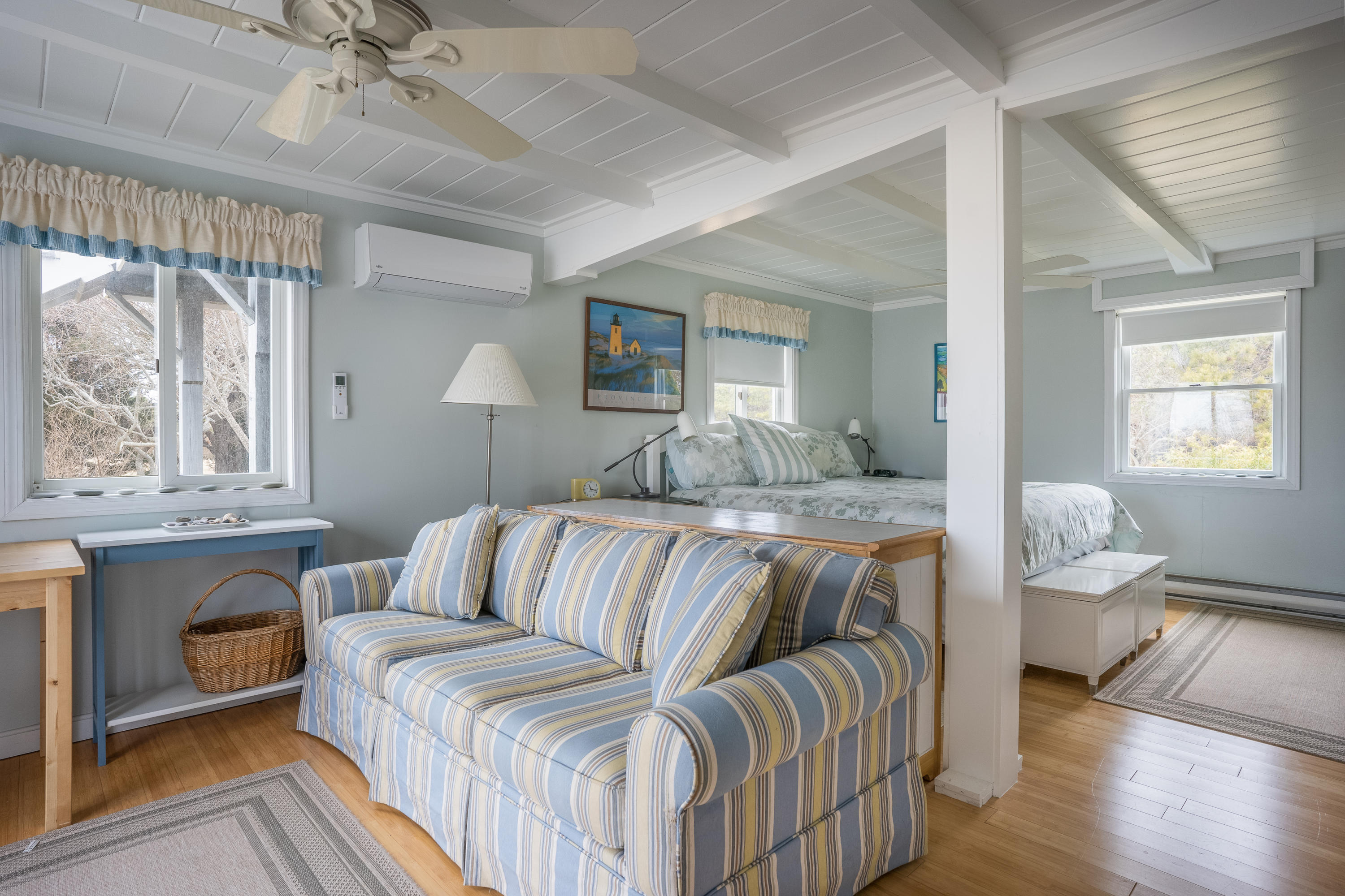 11 Bay View Drive Truro, MA 02666 - Photo 13 of 16 a bedroom with a bed and wooden floor