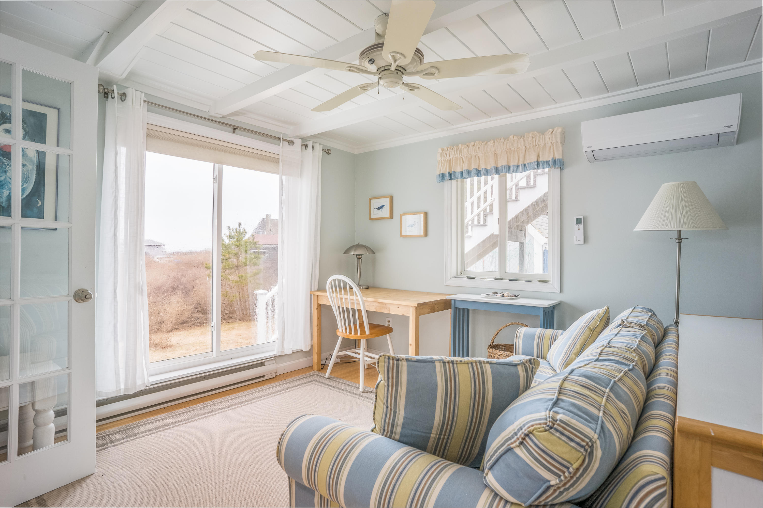 11 Bay View Drive Truro, MA 02666 - Photo 14 of 16 a living room with furniture and a large window