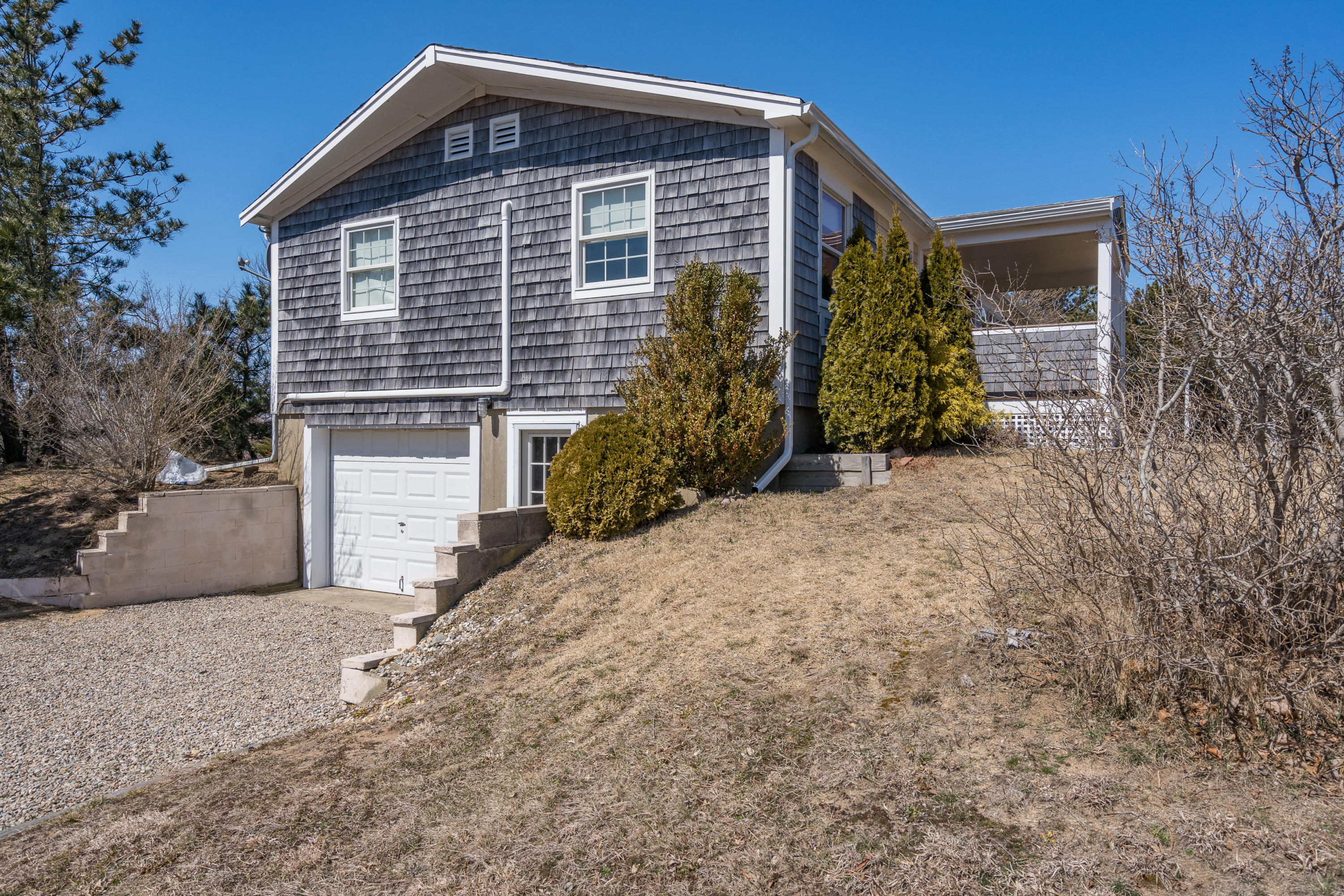 11 Bay View Drive Truro, MA 02666 - Photo 3 of 16 a front view of a house with garden