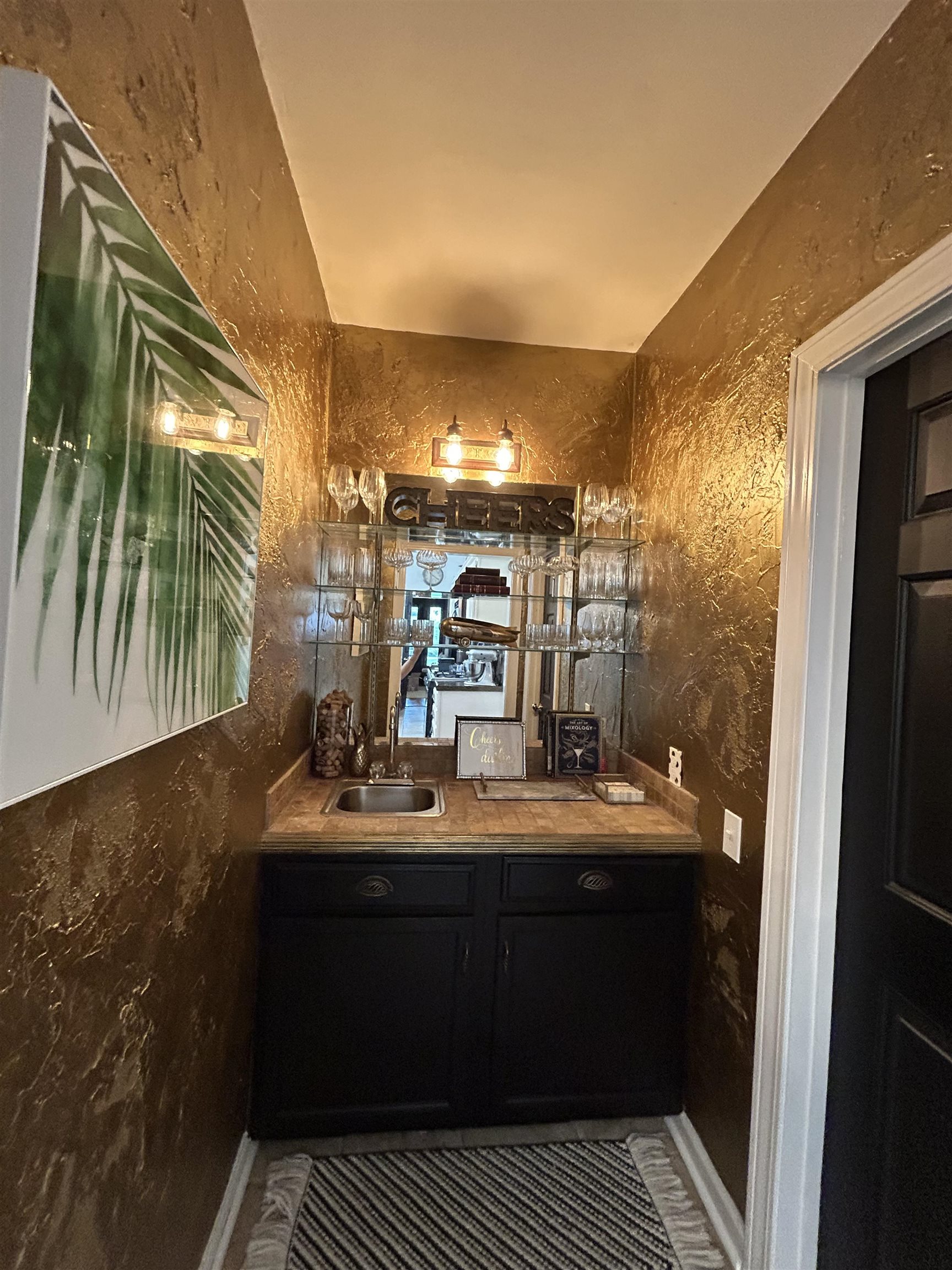 1680 Carruthers Place Memphis, TN 38112 - Photo 18 of 36 a bathroom with a sink and a mirror