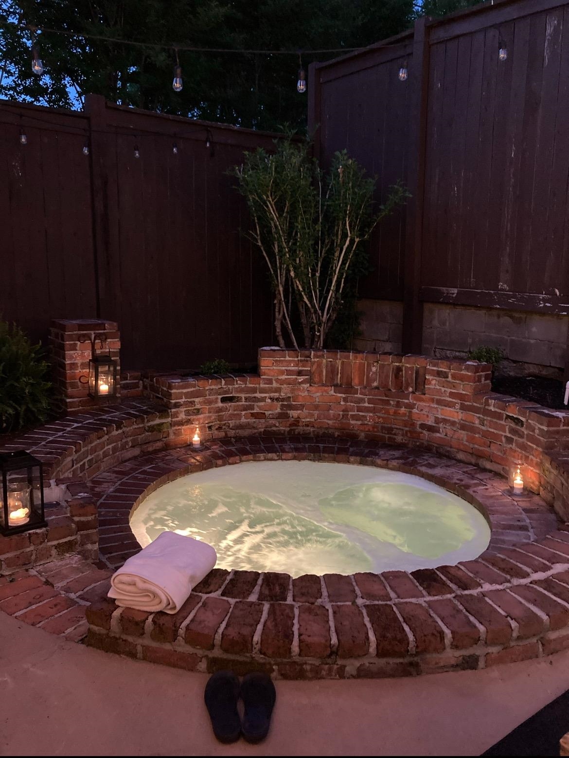 1680 Carruthers Place Memphis, TN 38112 - Photo 30 of 36 a view of a backyard with table and chairs