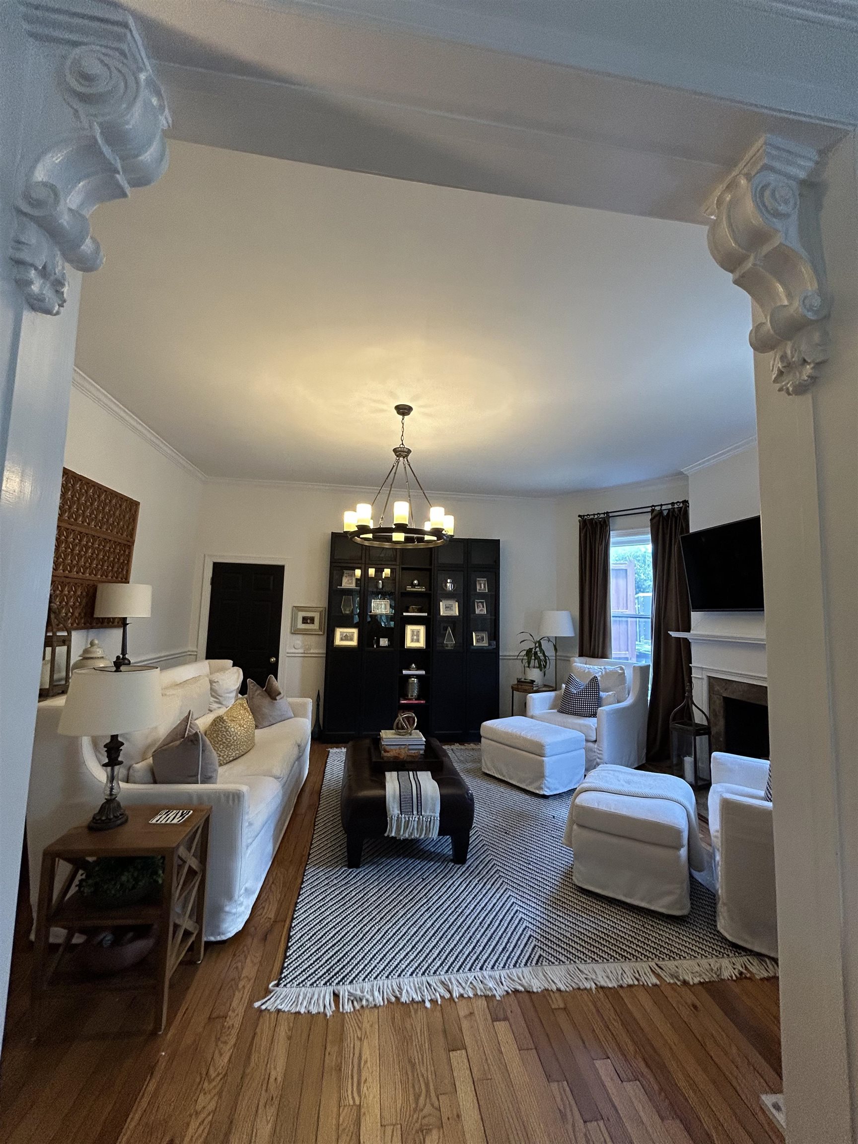 1680 Carruthers Place Memphis, TN 38112 - Photo 5 of 36 a living room with furniture and a fireplace