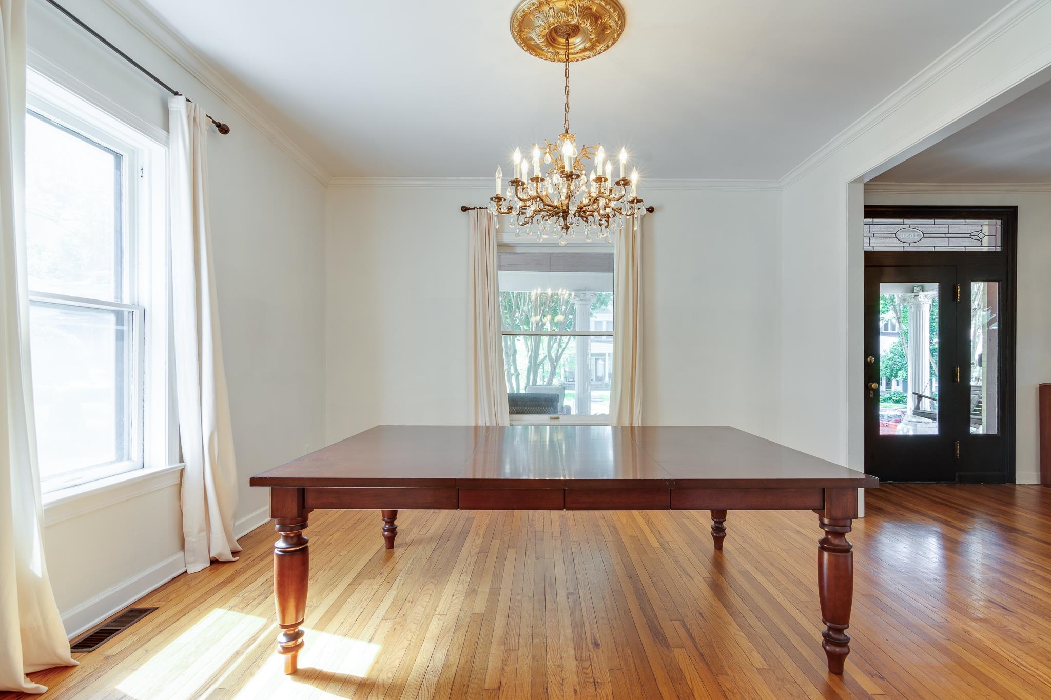 1680 Carruthers Place Memphis, TN 38112 - Photo 8 of 36 a view of a room with wooden floor and windows