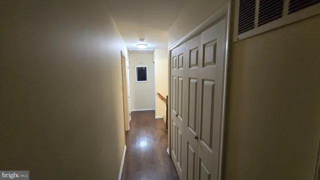 a view of entryway with wooden floor