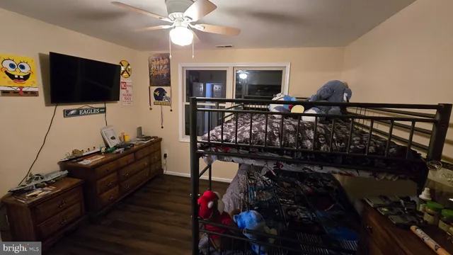 a room with furniture and flat screen tv