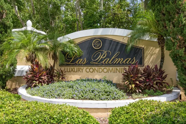 a view of sign board and a yard