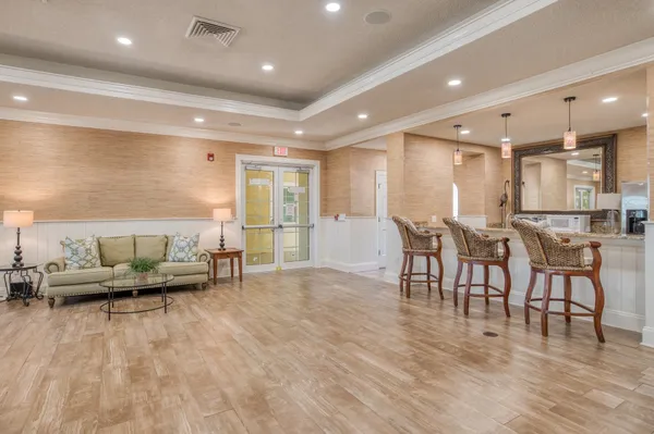 a living room with furniture and a table