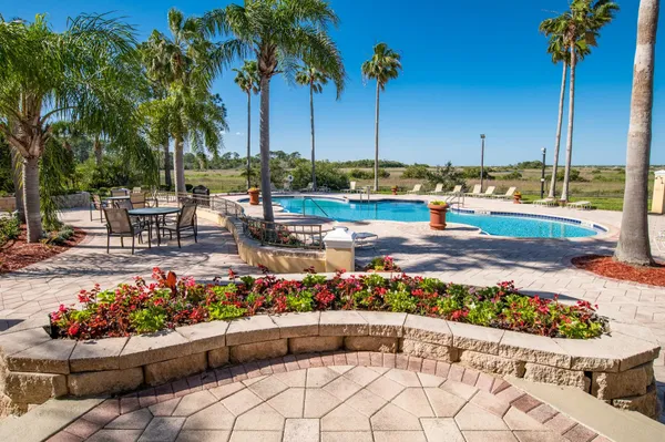 a area with lots of table and chairs