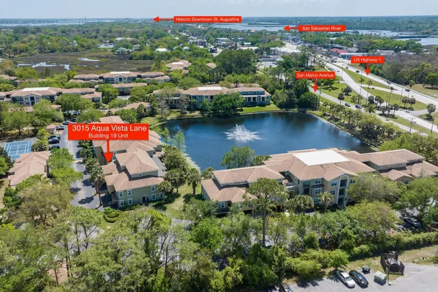 a view of a lake with a houses