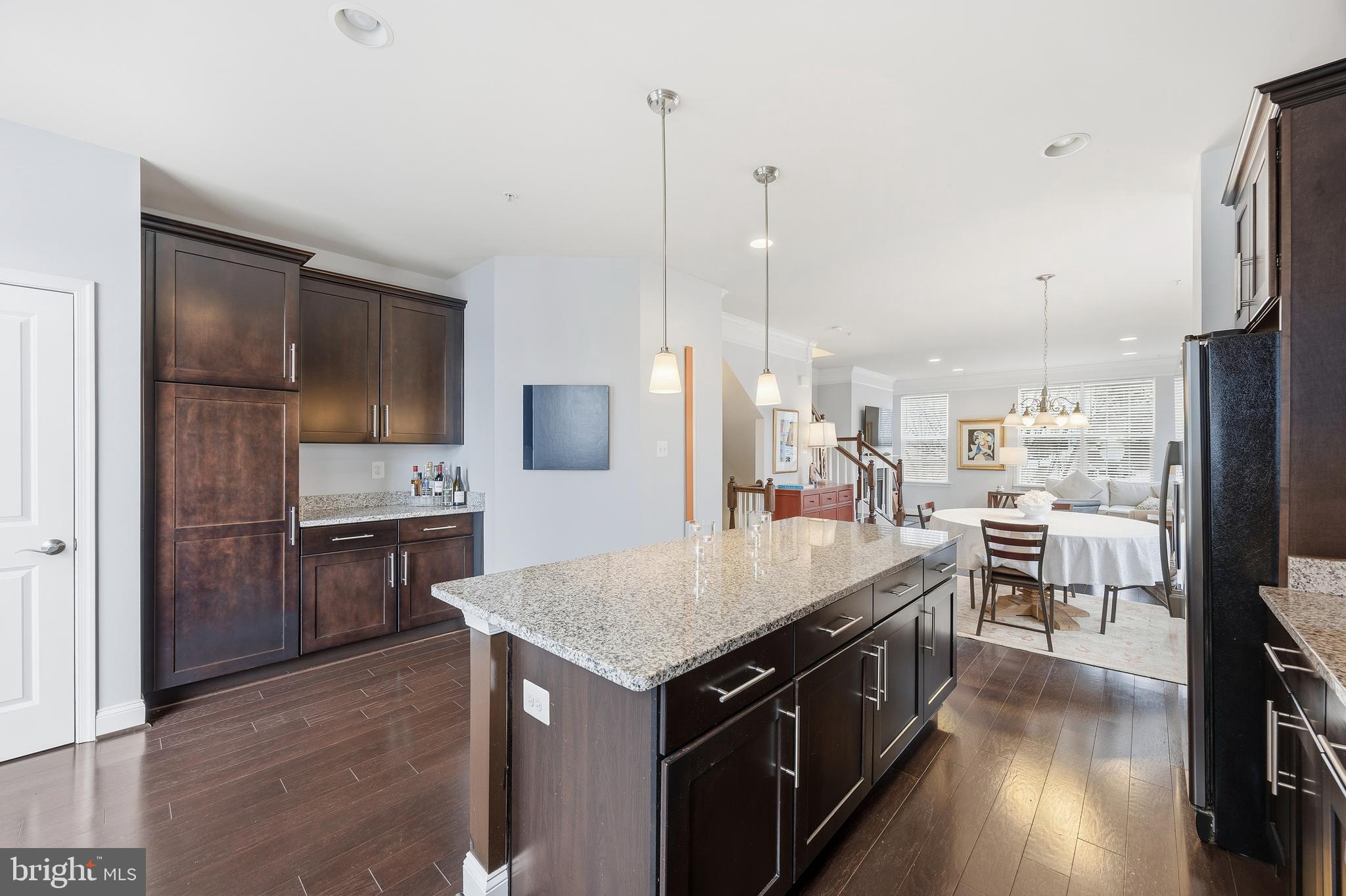 31 Meridian Lane Towson, MD 21286 - Photo 15 of 25 a large kitchen with a table and chairs