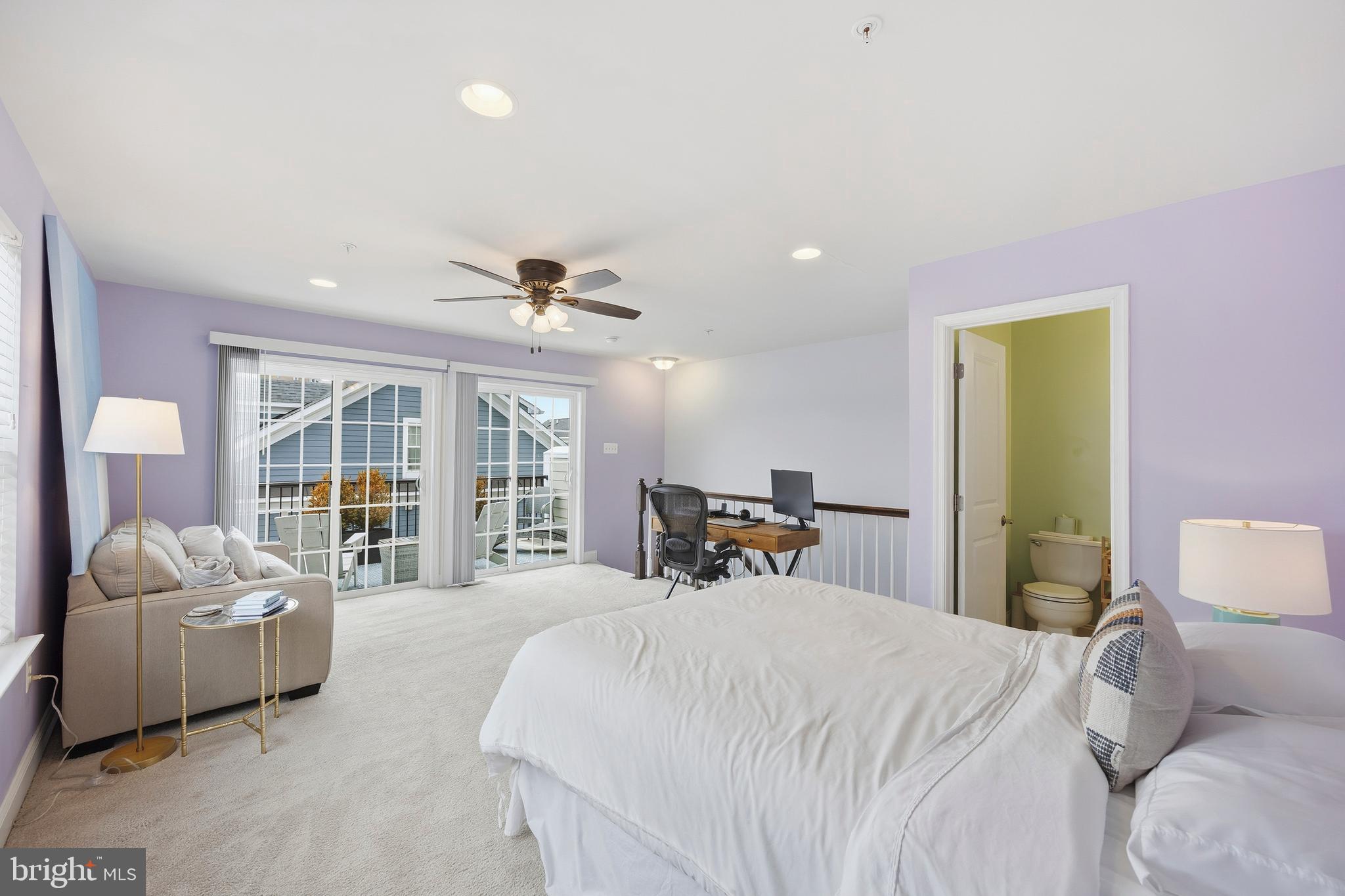 31 Meridian Lane Towson, MD 21286 - Photo 22 of 25 a spacious bedroom with a bed and glass window