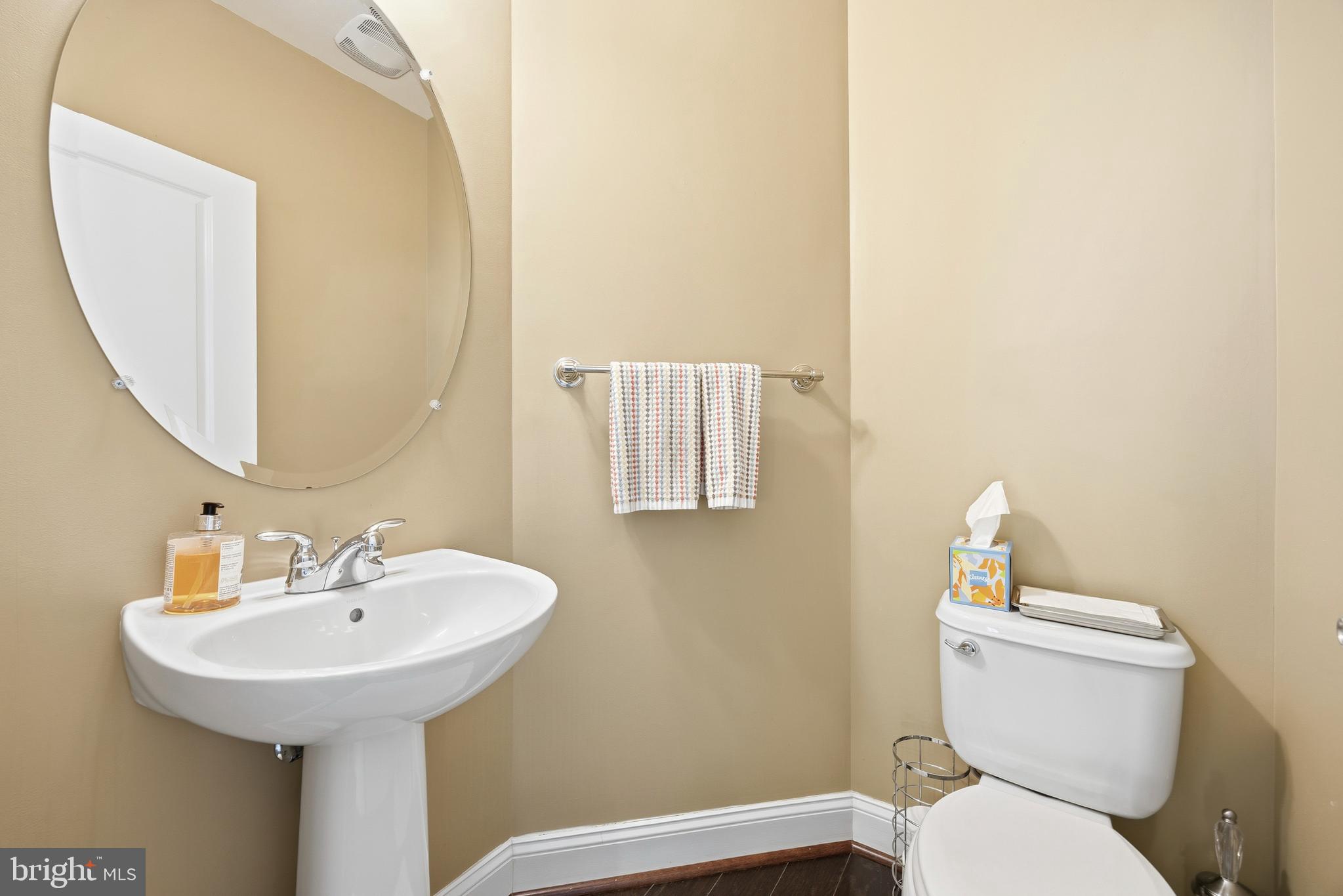 31 Meridian Lane Towson, MD 21286 - Photo 6 of 25 a bathroom with a sink and a toilet