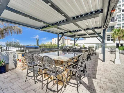 a view of a terrace with sitting area