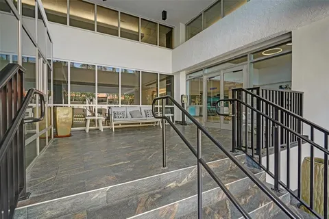 a view of swimming pool in front of building