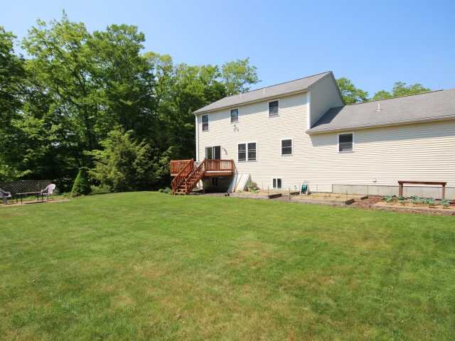 335 Widow Sweets Road Exeter, RI 02822 - Photo 15 of 19 Exterior Back. Enjoy beautiful views from deck!