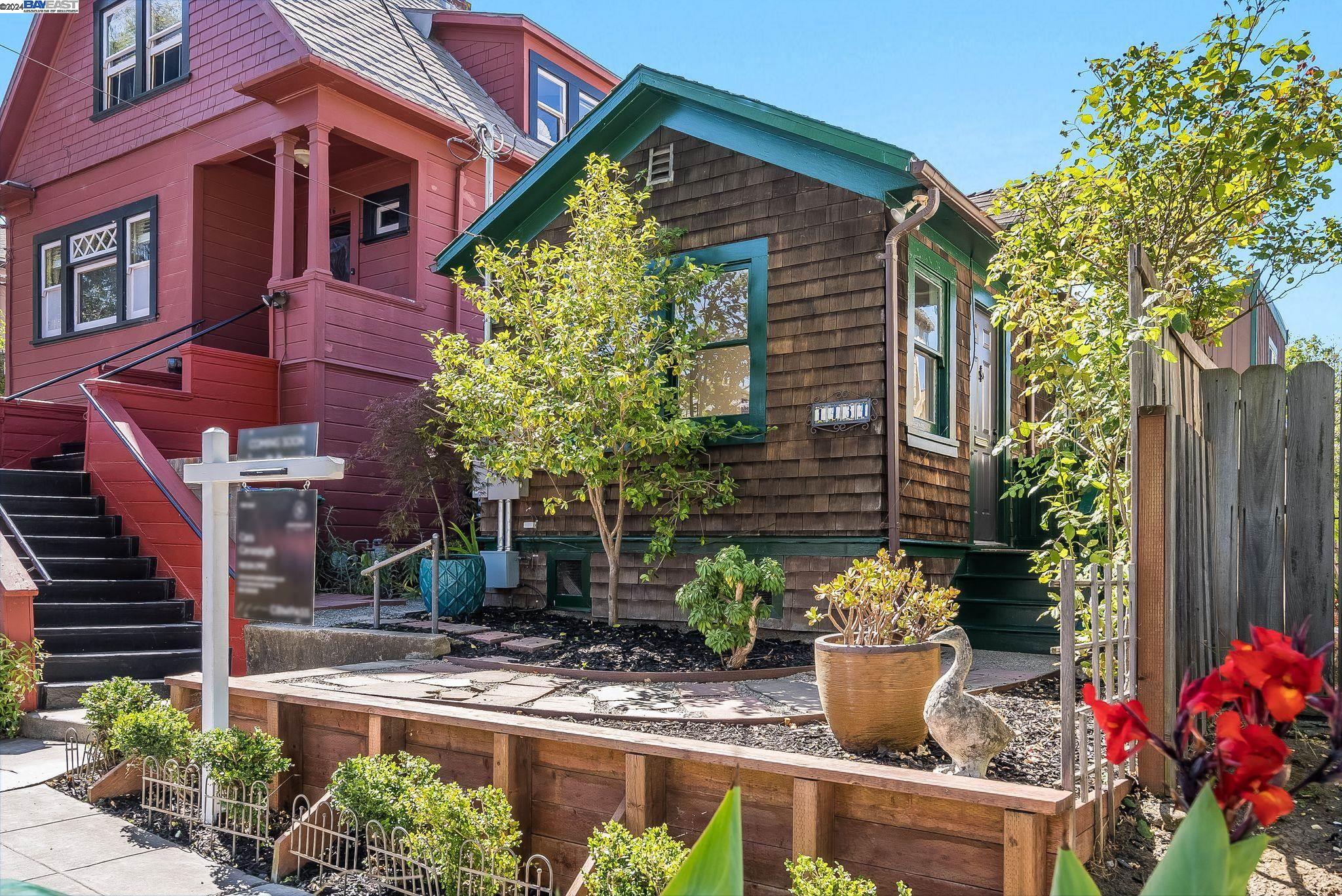 1434 Berkeley Way Berkeley, CA 94702 - Photo 1 of 1 a front view of a house with a yard