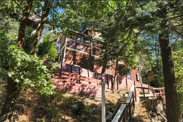 a backyard of a house with lots of green space