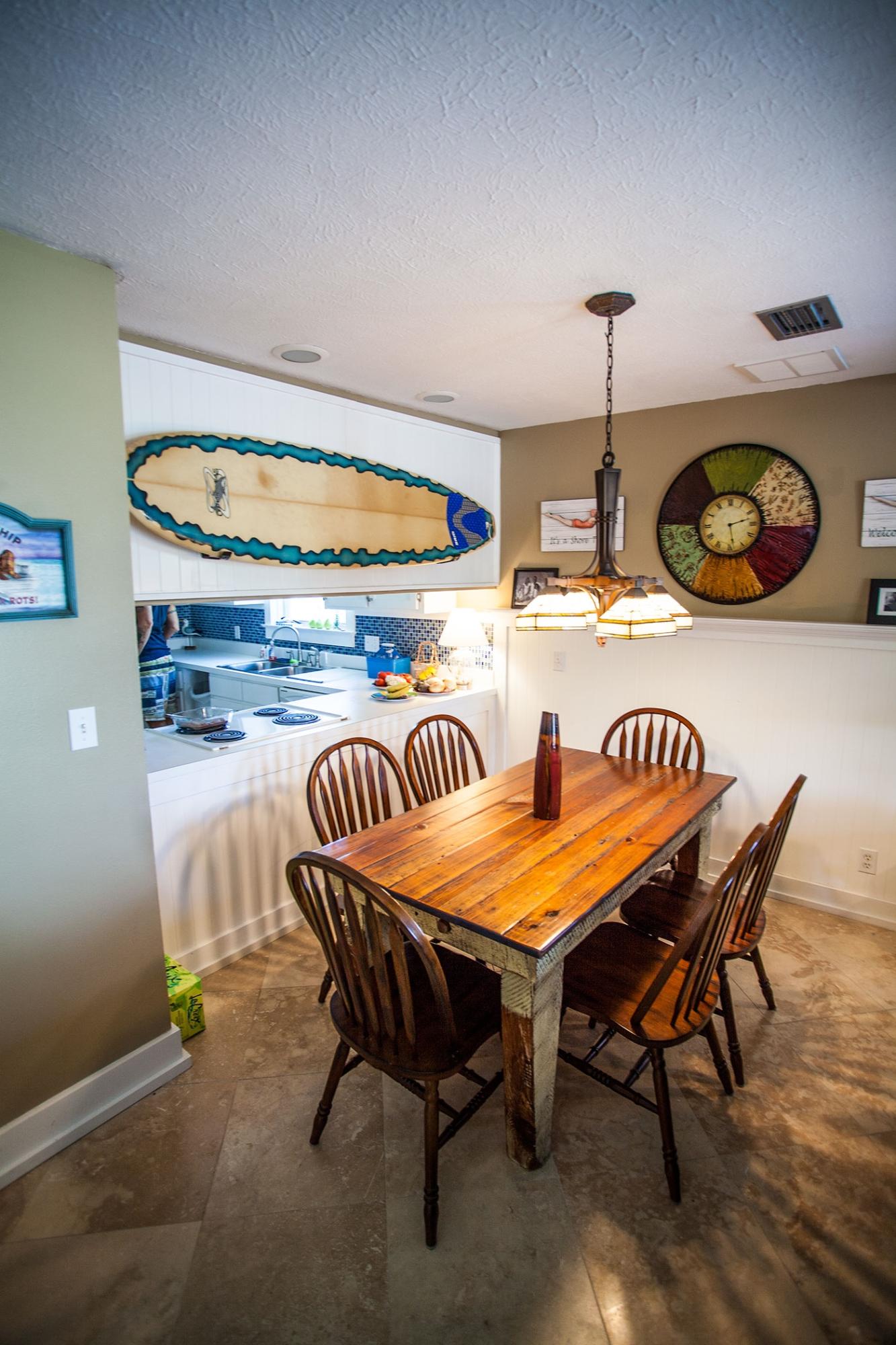 191 Blue Mountain Road, Unit 201 Santa Rosa Beach, FL 32459 - Photo 7 of 16 a dinning table and chairs in a room