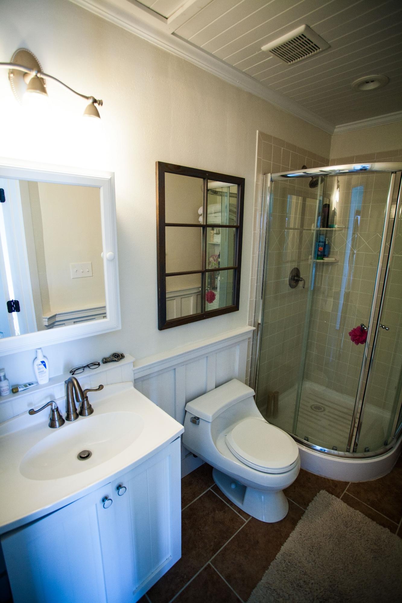 191 Blue Mountain Road, Unit 201 Santa Rosa Beach, FL 32459 - Photo 9 of 16 a bathroom with a sink toilet and shower