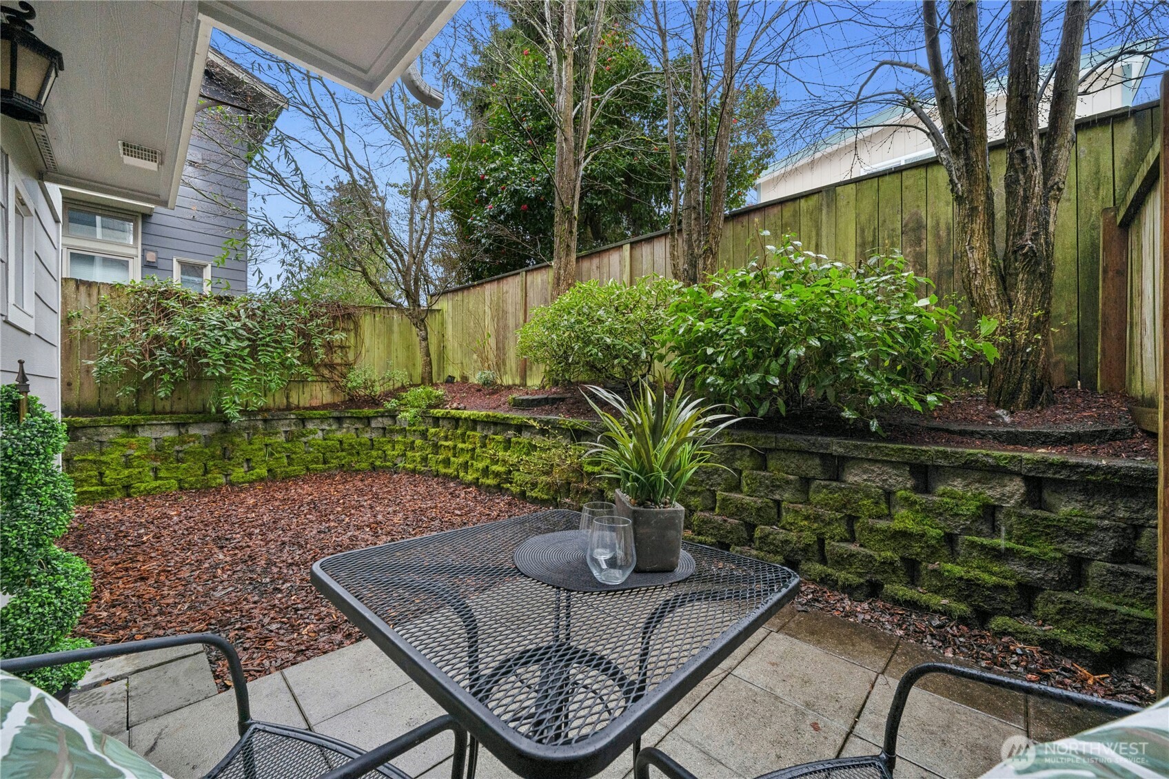 1341 14th Avenue South, Unit B Seattle, WA 98144 - Photo 25 of 26 a view of backyard with patio and outdoor seating