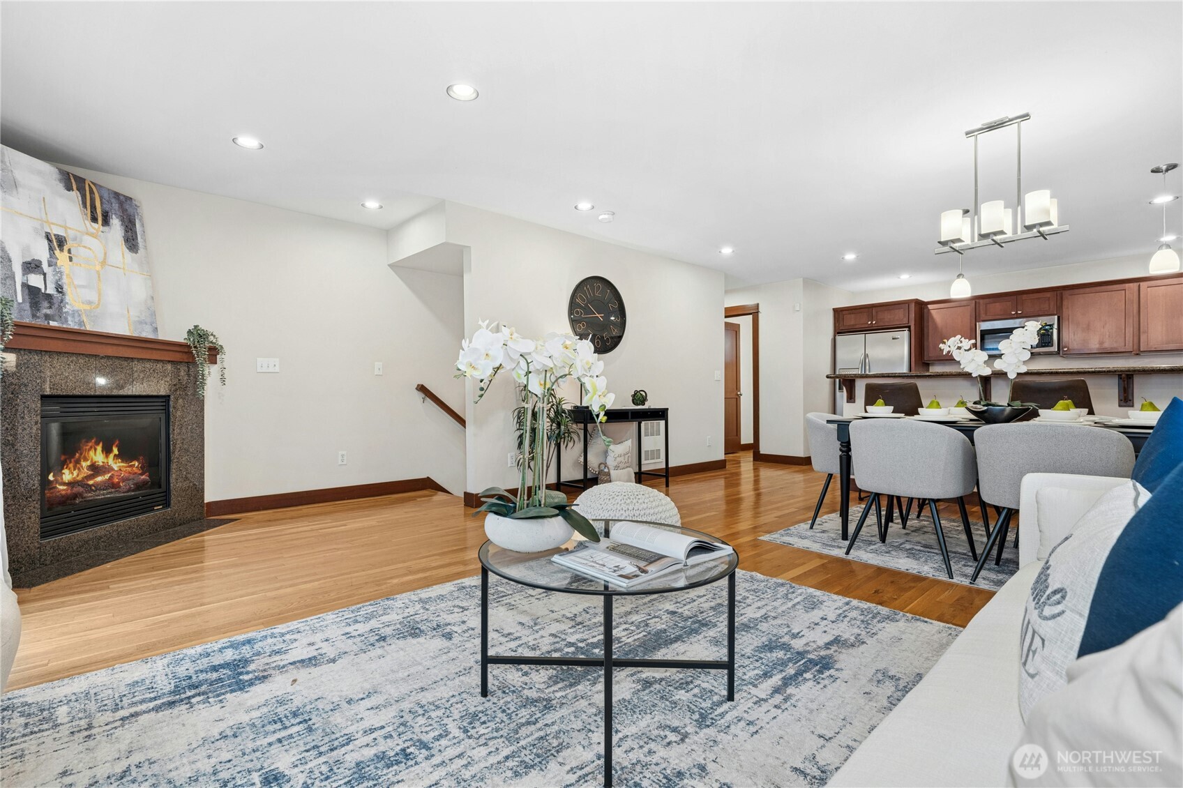 1341 14th Avenue South, Unit B Seattle, WA 98144 - Photo 5 of 26 a living room with furniture and a fireplace