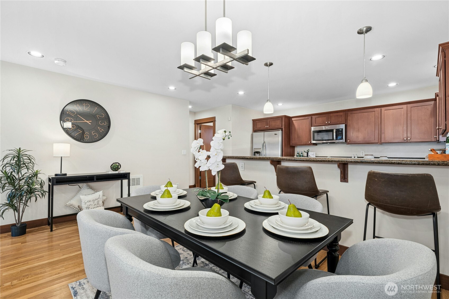 1341 14th Avenue South, Unit B Seattle, WA 98144 - Photo 7 of 26 a view of a dining room with furniture and wooden floor