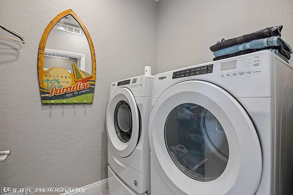 1304 Cottage Ridge Mesquite, NV 89034 - Photo 21 of 52 Streamlined laundry area with a modern washer and dryer set, simplifying daily chores.