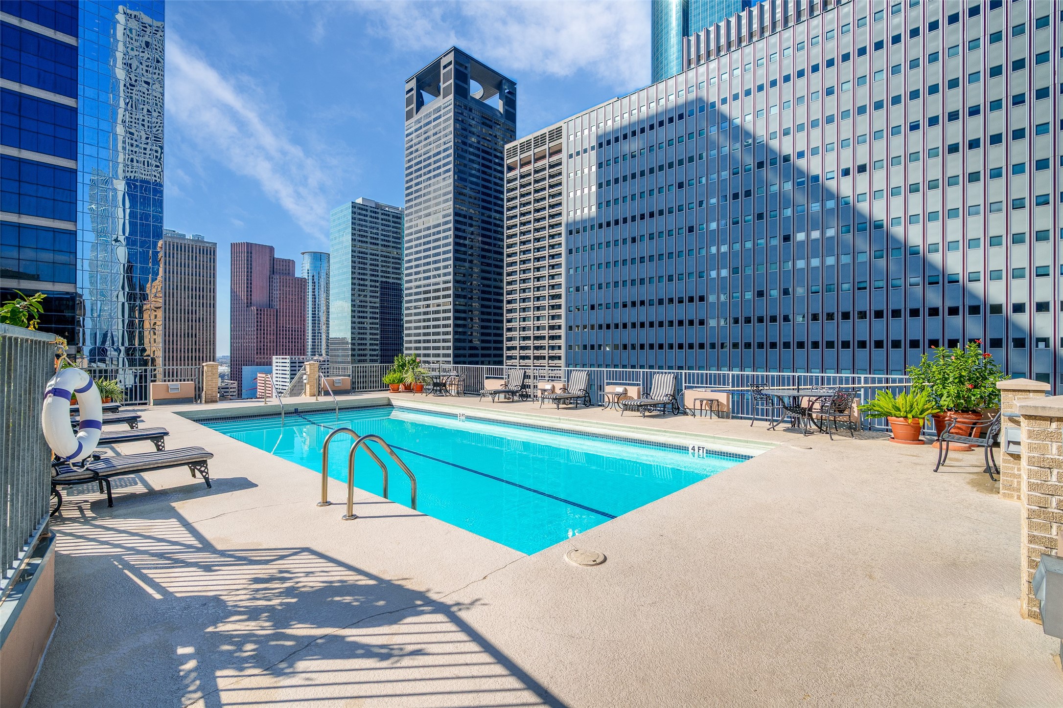 914 Main Street, Unit 1902 Houston, TX 77002 - Photo 23 of 32 a view of swimming pool with outdoor seating