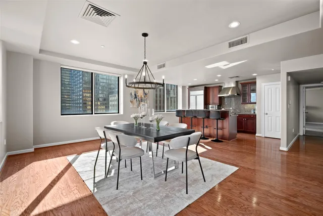 a view of a dining room with furniture
