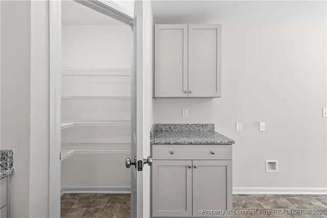 a view of a hallway with entryway