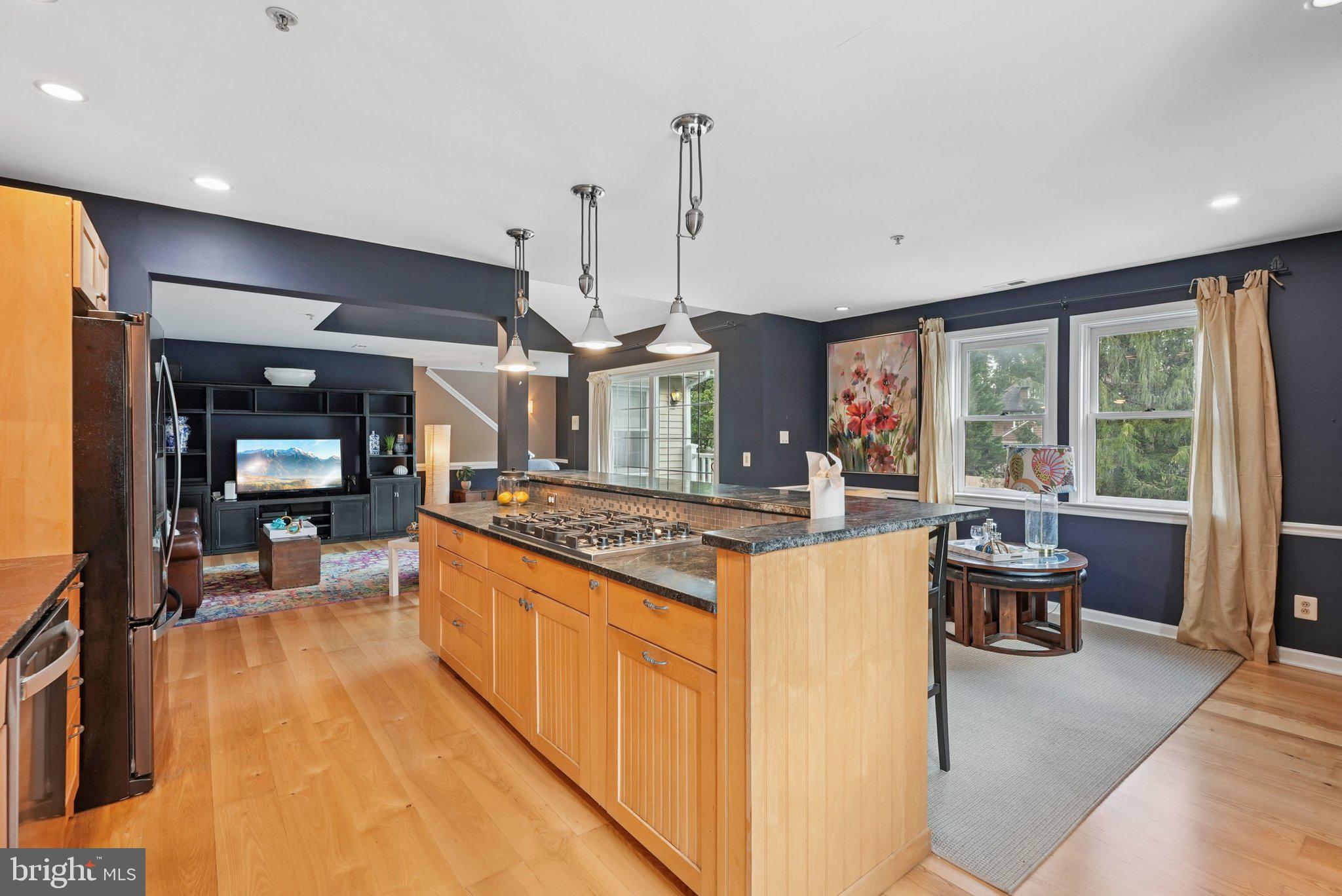 9 Comly Court Flourtown, PA 19031 - Photo 11 of 32 a open kitchen with stainless steel appliances granite countertop a stove and refrigerator