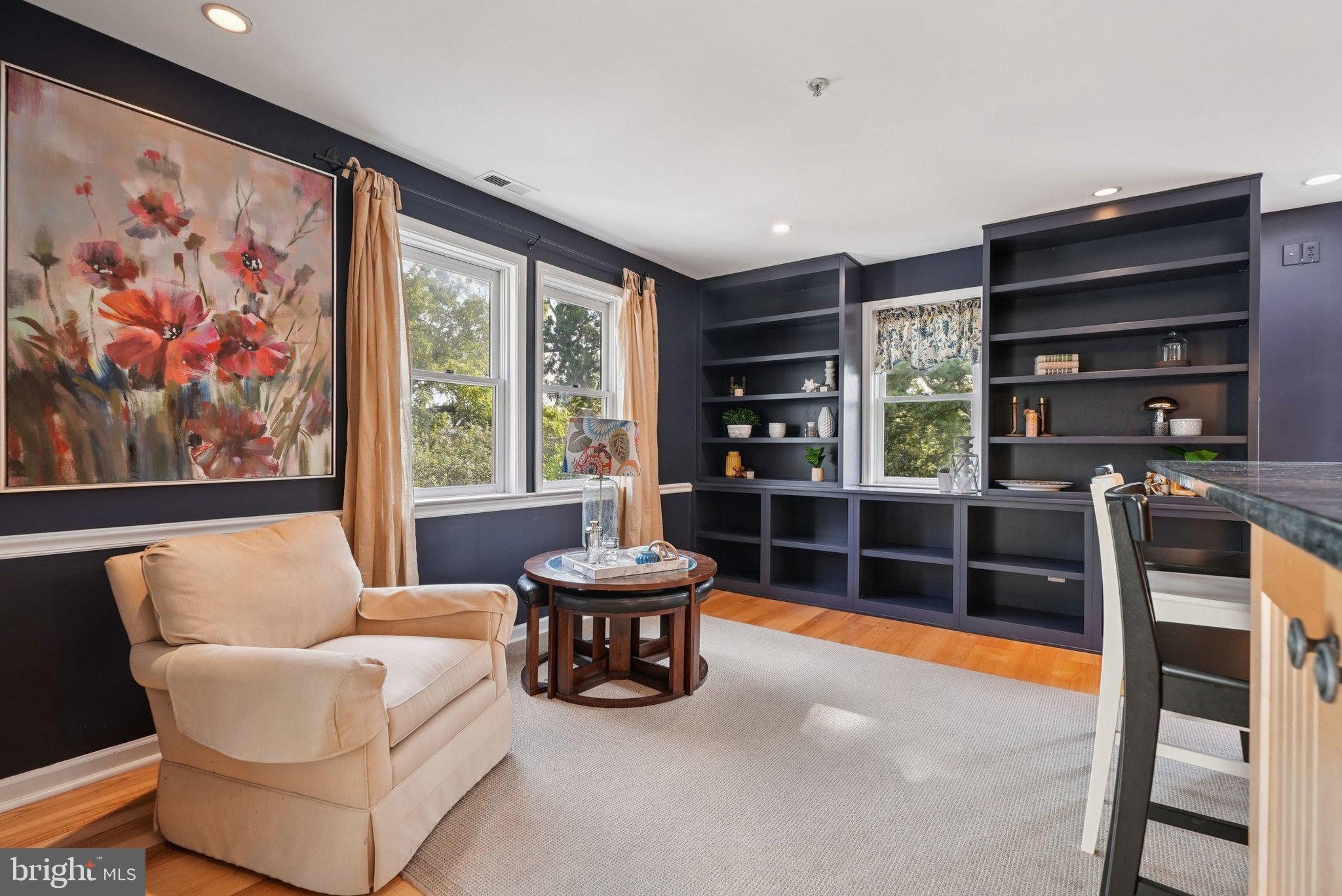 9 Comly Court Flourtown, PA 19031 - Photo 13 of 32 a living room with furniture a rug and a large window