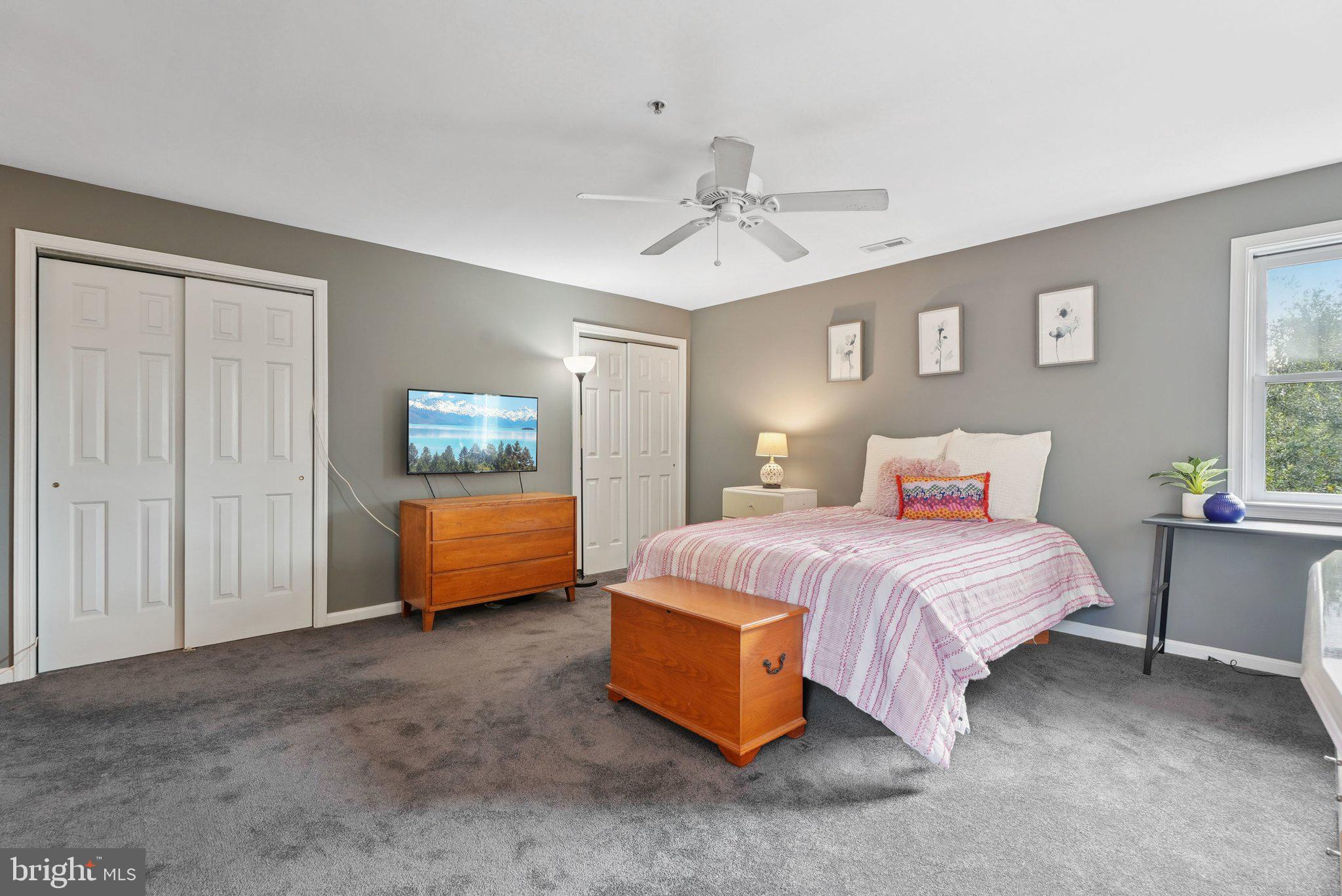 9 Comly Court Flourtown, PA 19031 - Photo 15 of 32 a bedroom with a bed and a window