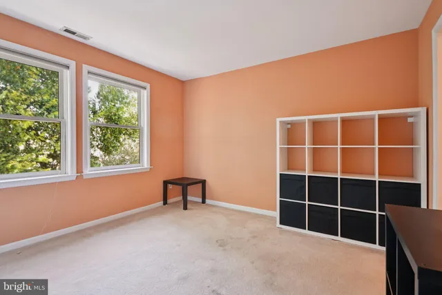 a view of a livingroom with furniture and window