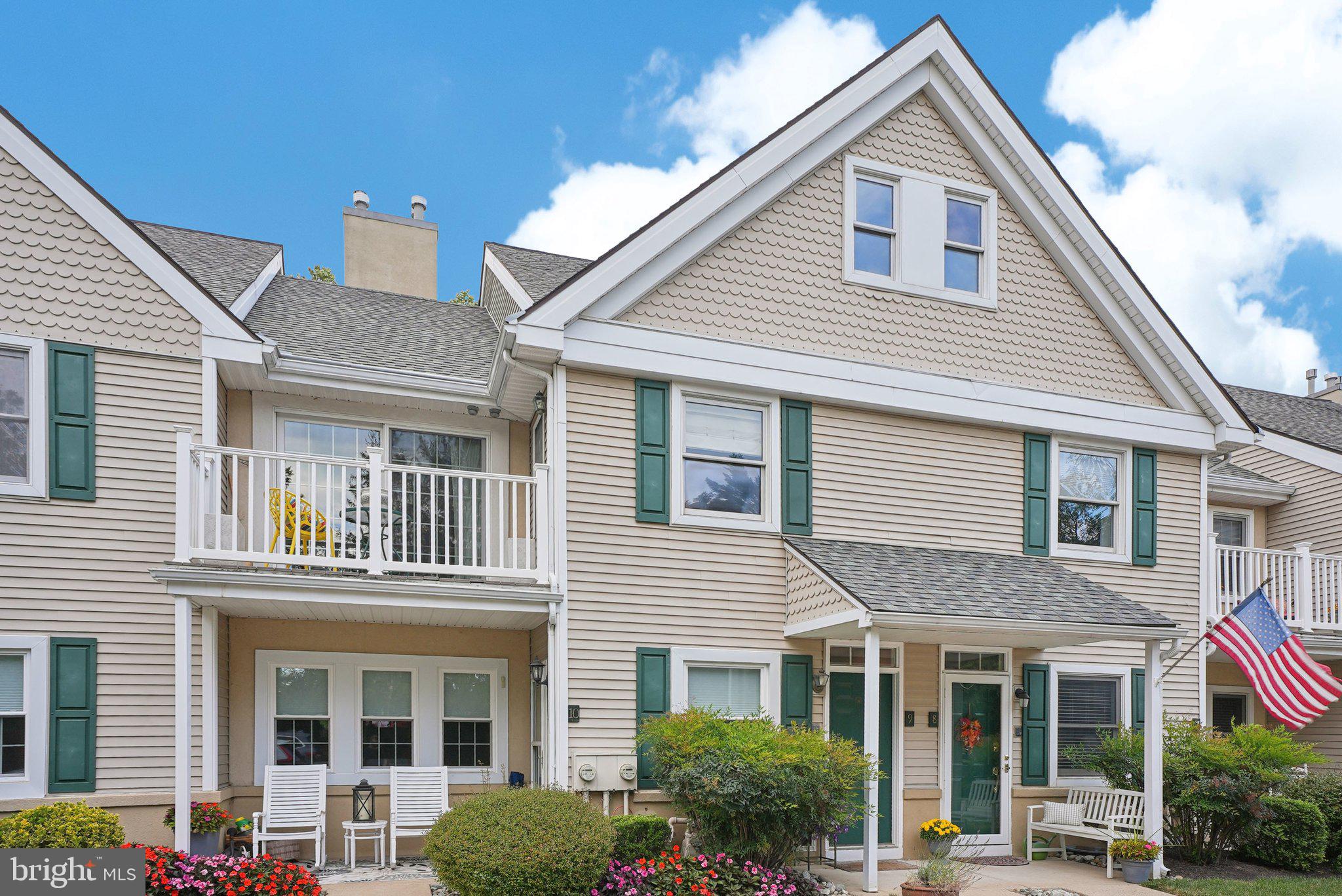 9 Comly Court Flourtown, PA 19031 - Photo 2 of 32 a front view of a house with a yard