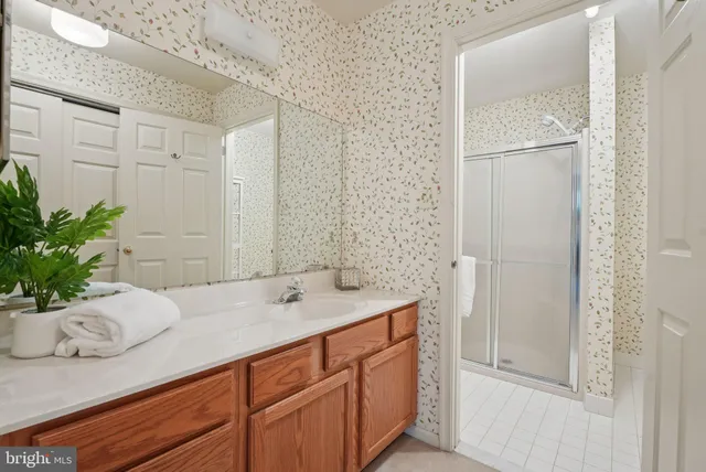 a bathroom with a sink a vanity and a mirror