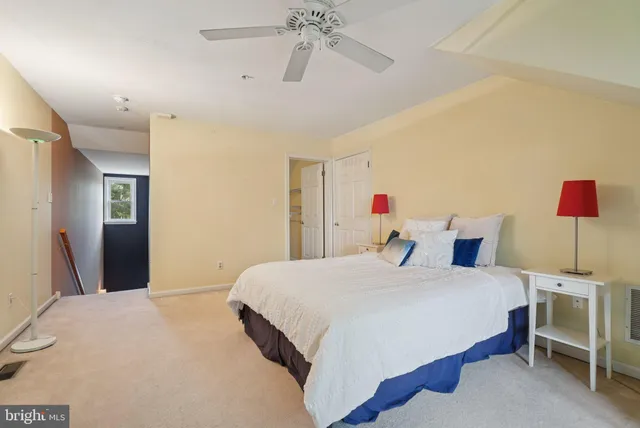 a bathroom with a shower a sink and a mirror