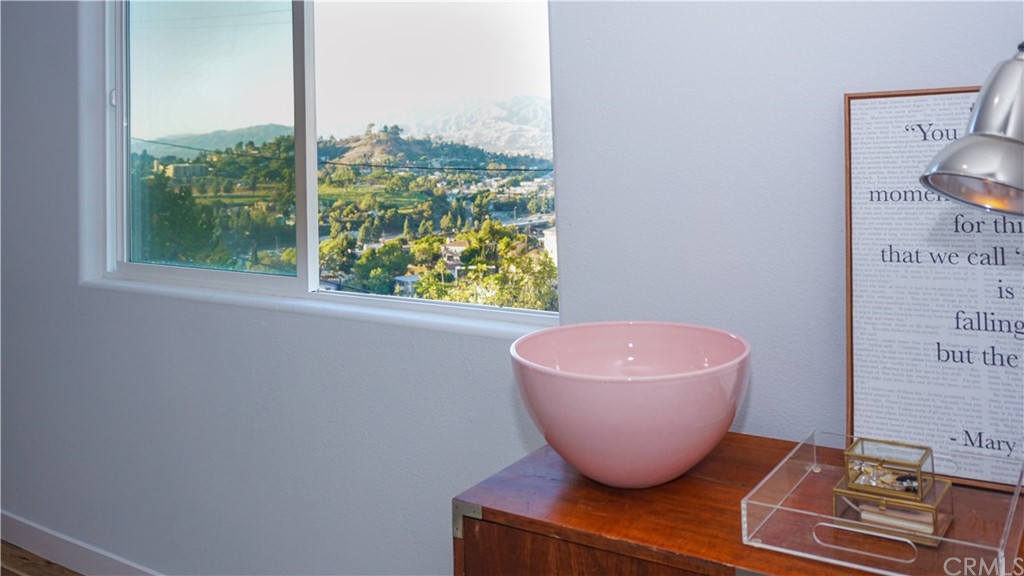 2608 Hines Drive Los Angeles, CA 90065 - Photo 20 of 38 a room with wooden floor and a window