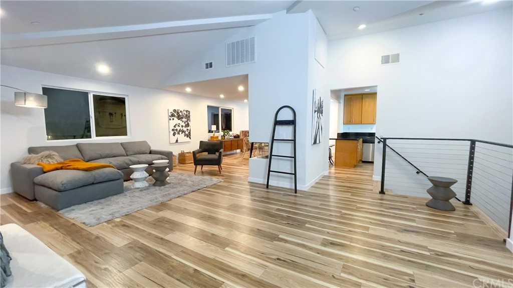 2608 Hines Drive Los Angeles, CA 90065 - Photo 22 of 38 a living room with furniture and a wooden floor
